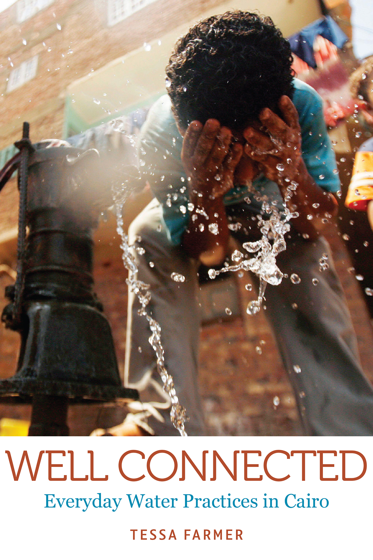 Book cover for Farmer's book, featuring a presumably adolescent child splashing water on their face