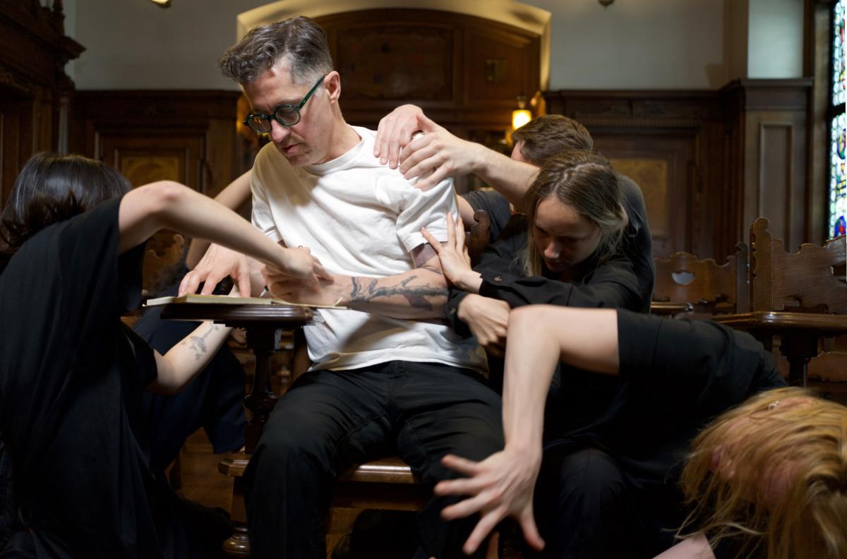 Schmalz sitting at a desk